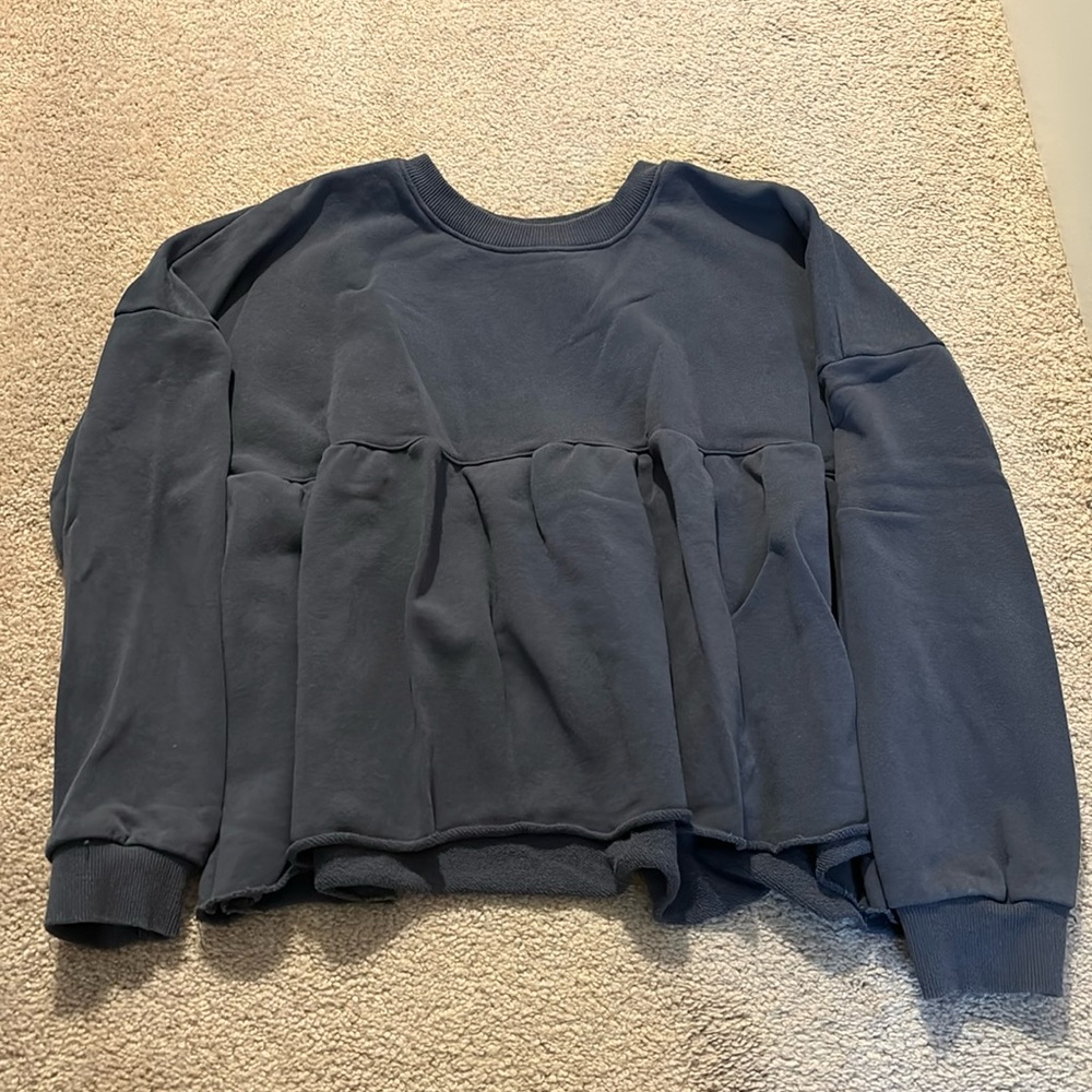 Dusty blue, cropped crew neck sweatshirt.